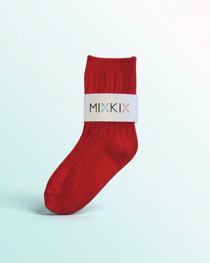 Red crew socks for kids made from 100% cotton. 