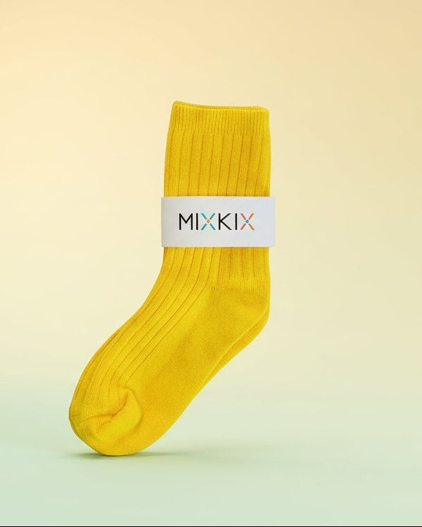 Bright yellow ribbed sock for kids in soft cotton and crew style. 