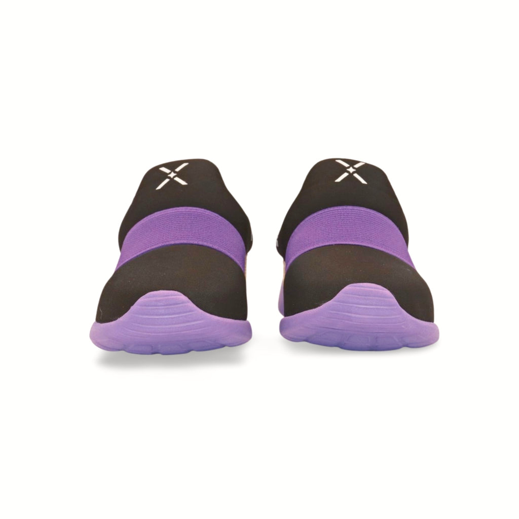 Black and purple 90s style kids slip-on sneakers with bold patterns and supportive cushioning for girls and boys. 