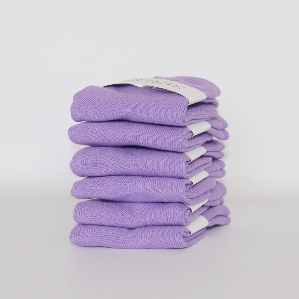 Purple solid coloured 100% cotton socks for kids.