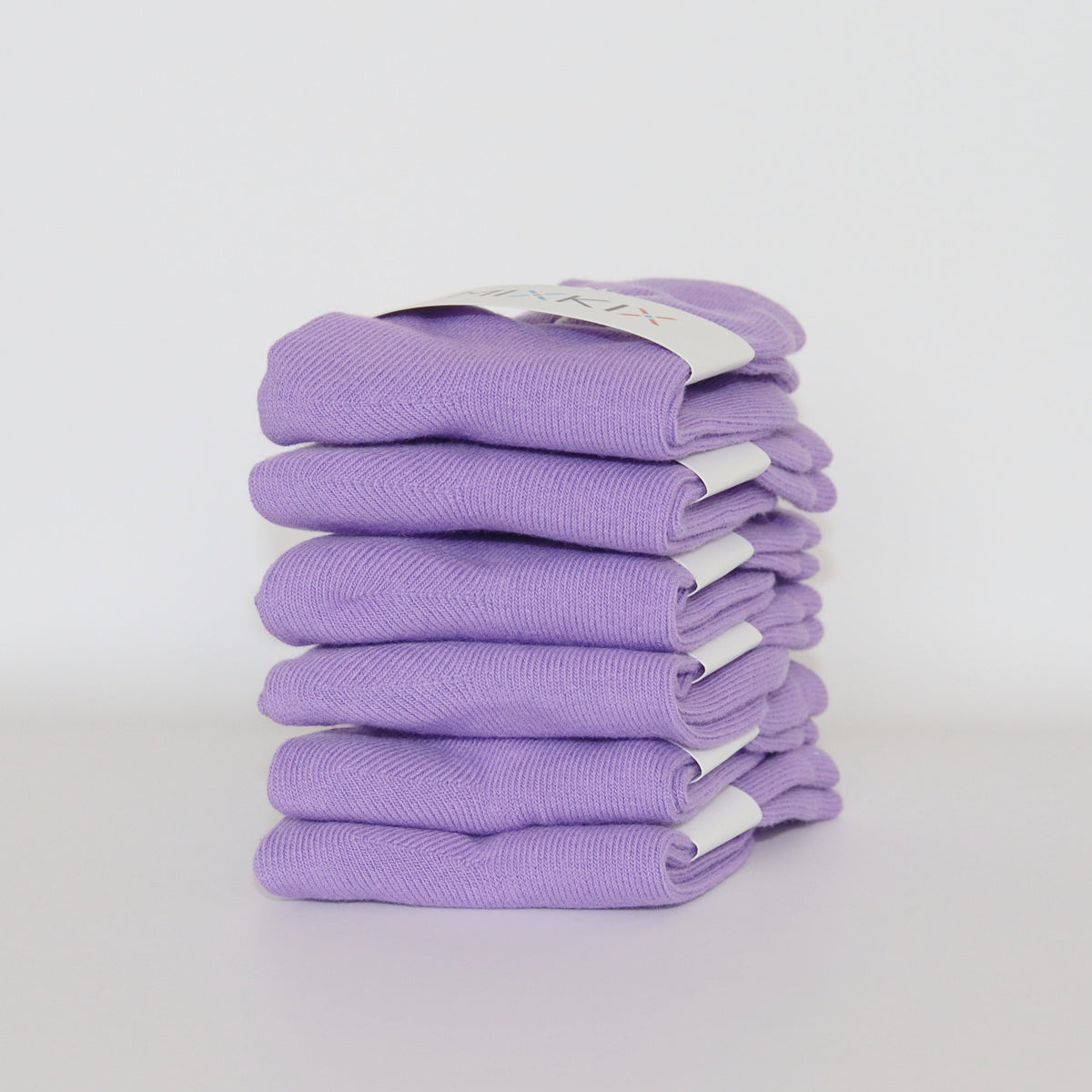 Purple solid coloured 100% cotton socks for kids.