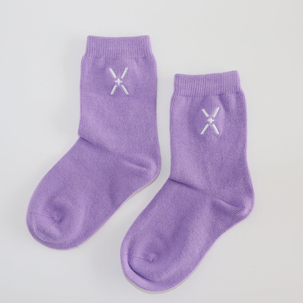 Purple solid coloured 100% cotton socks for kids.